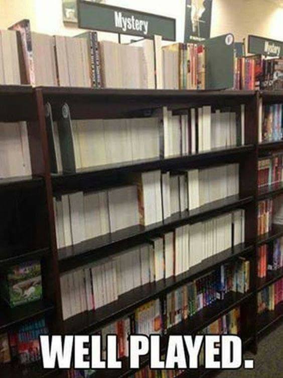 Mystery Meme - Some true mysteries: Someone had a great time in a bookstore turning the book titles spine in instead of out. Check out this Book Meme.